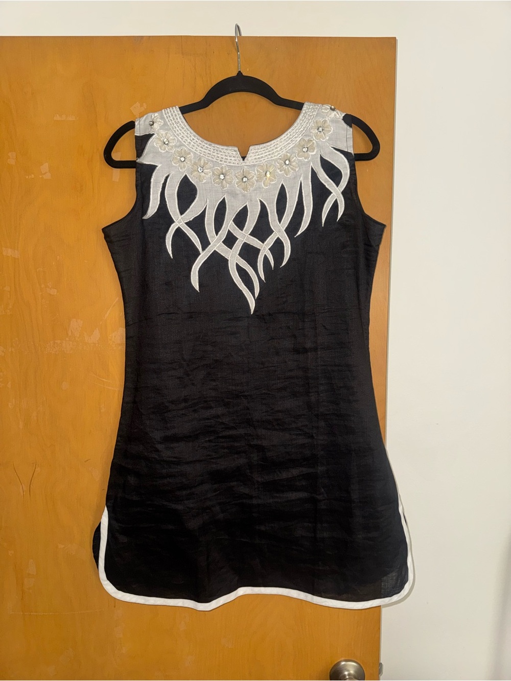 Sleeveless Black Tunic with White Embroidered Neckline